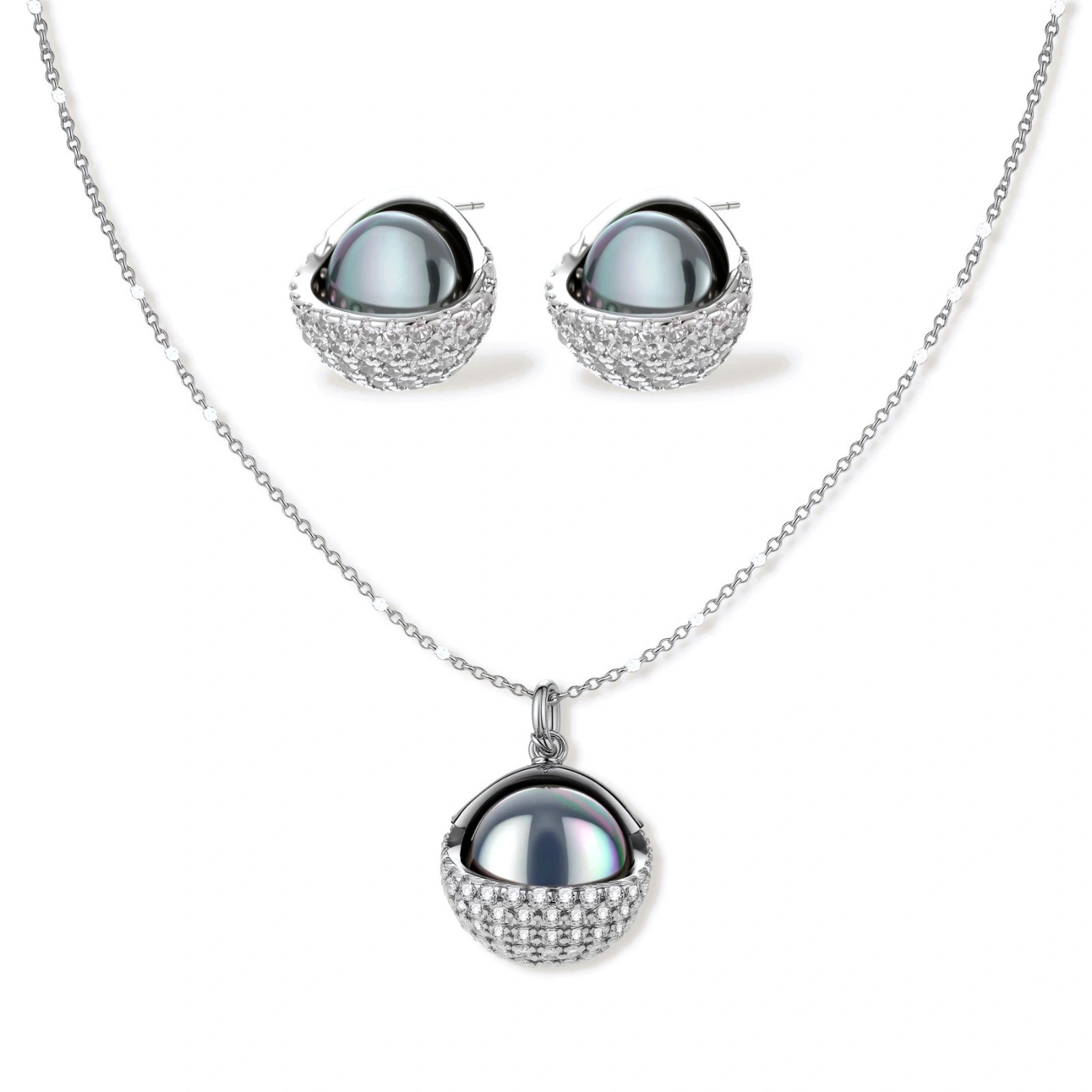 White gold plated spherical jewelry set with zirconia crystal pavé and dark lustrous centers on neutral background.