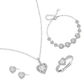 Complete jewelry set with heart-shaped sterling silver pieces featuring brilliant moissanite stones on white background.