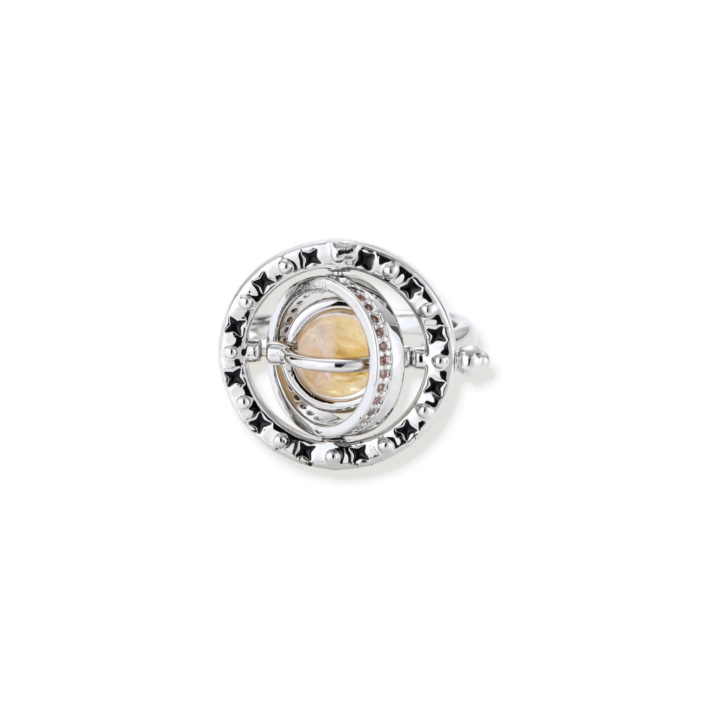 Adjustable brass ring with rotating zirconia center, surrounded by black enamel celestial stars and moon details