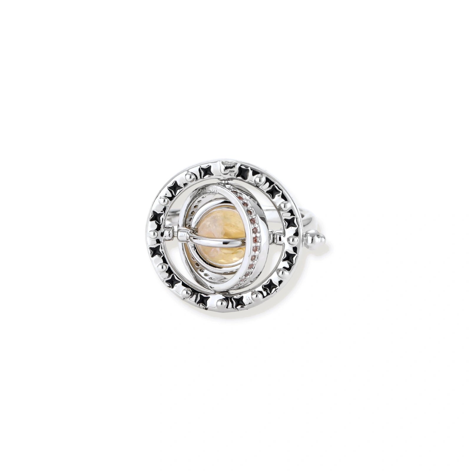 Adjustable brass ring with rotating zirconia center, surrounded by black enamel celestial stars and moon details