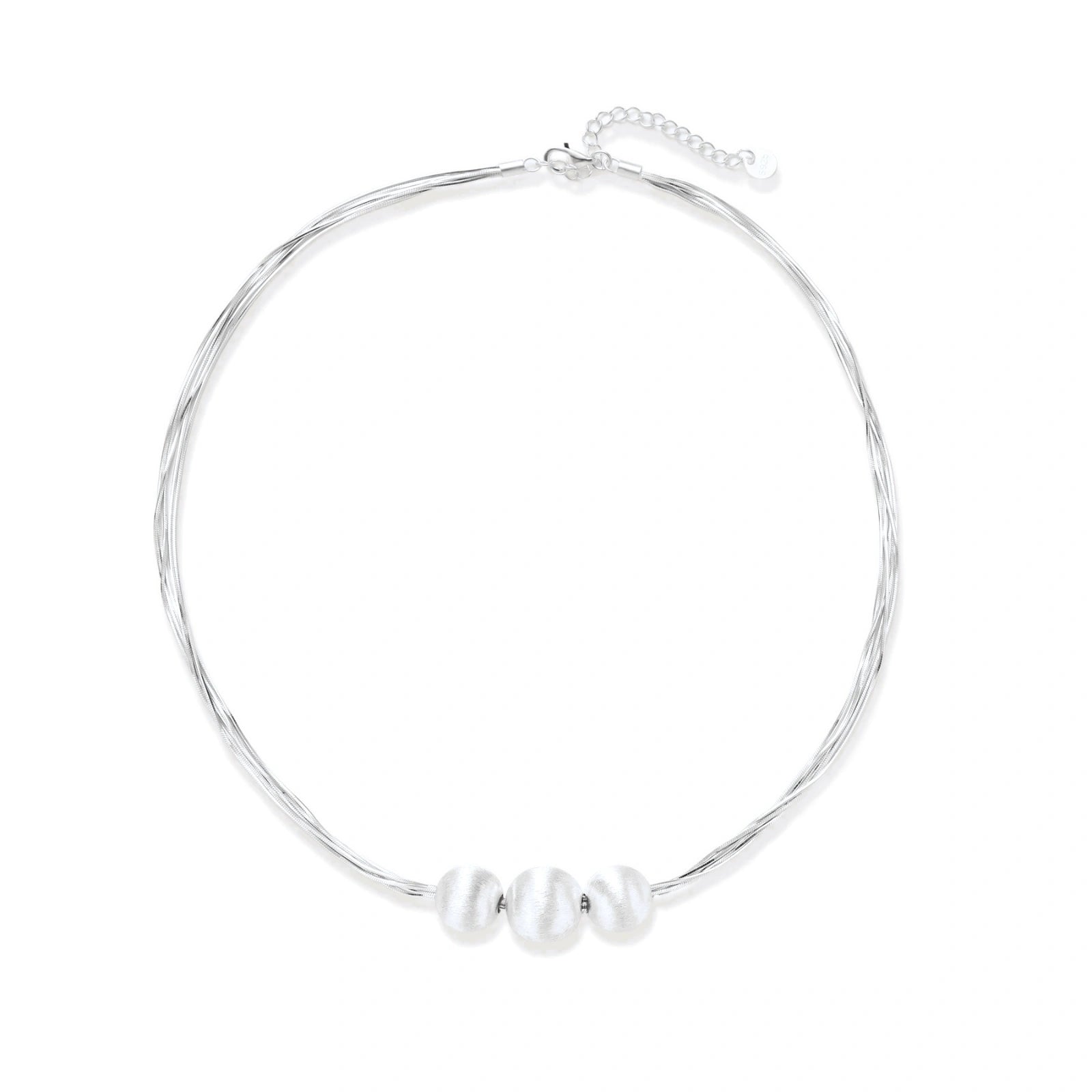 Sterling silver multi-strand necklace with three brushed round beads on cream background