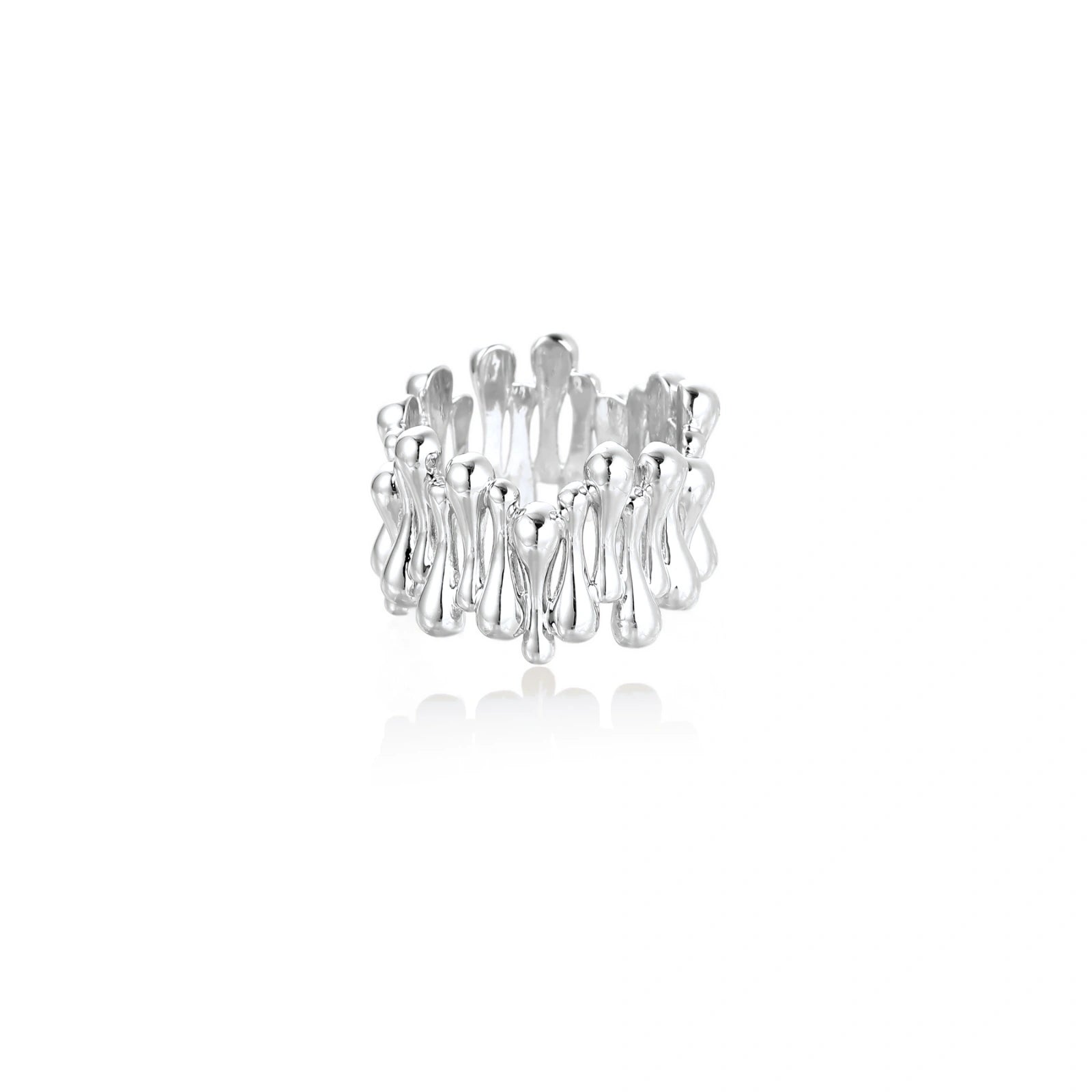 Wide band ring with sculptural wave ripples in polished white gold plated eco-brass on cream background