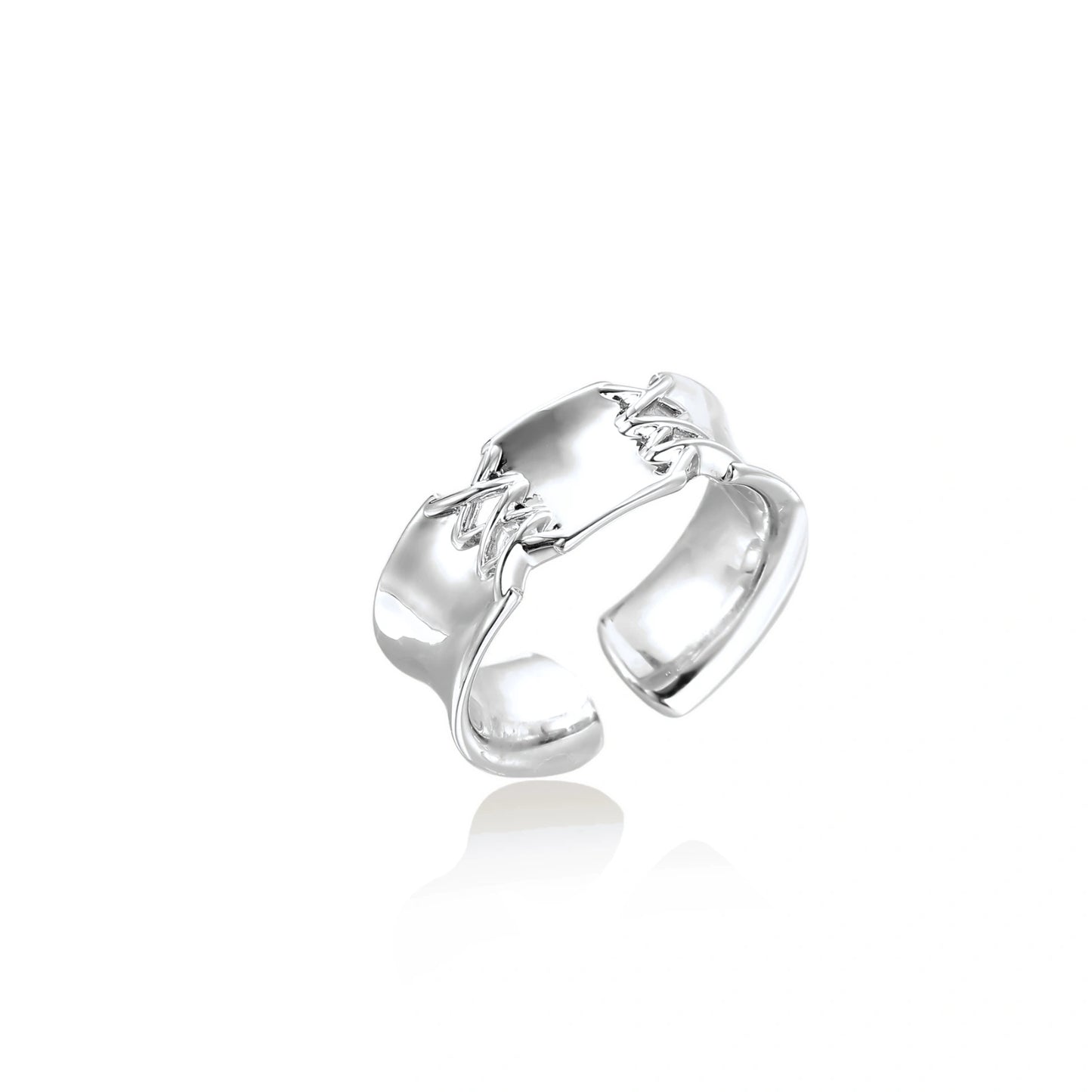 Adjustable silver-toned ring with sculptural stitch design across polished white gold-plated brass band