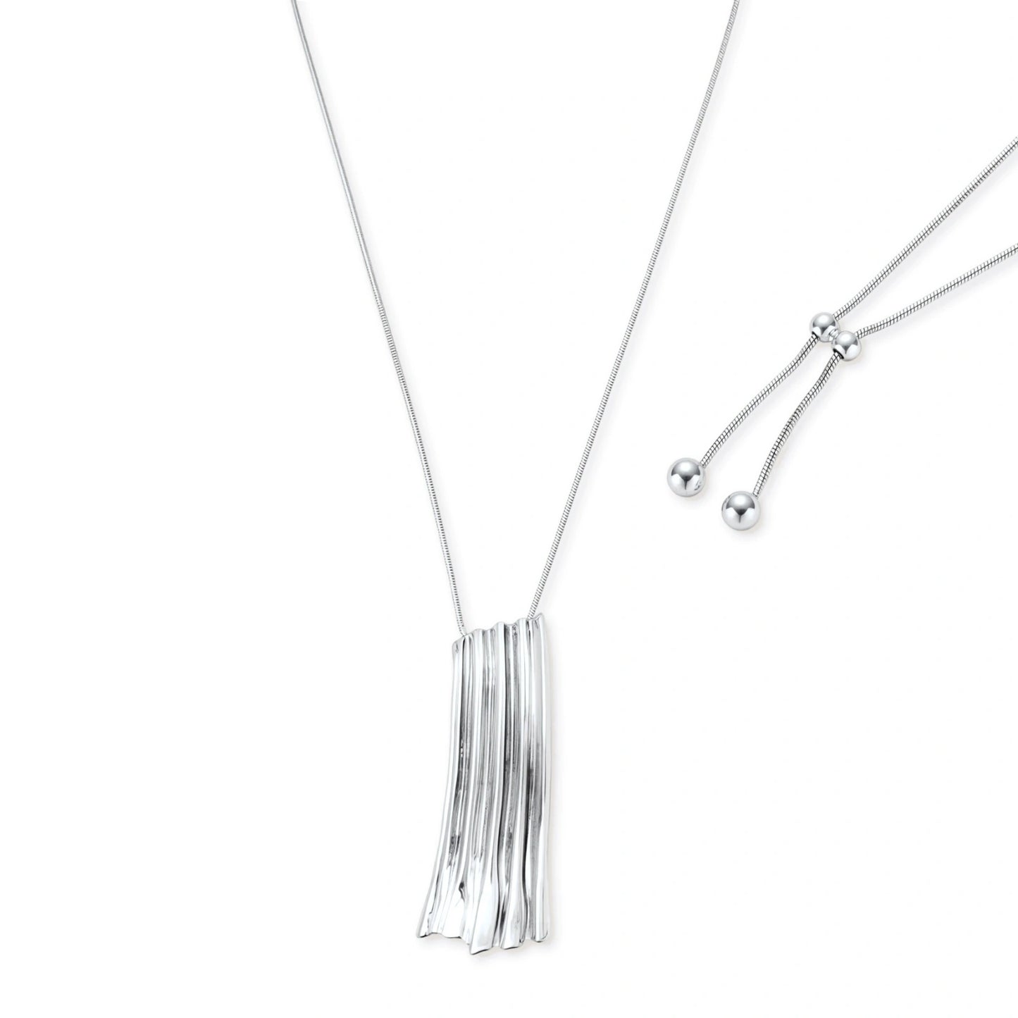 Modern silver necklace with vertical ridged pendant and adjustable chain on white background, eco-friendly zinc alloy construction.