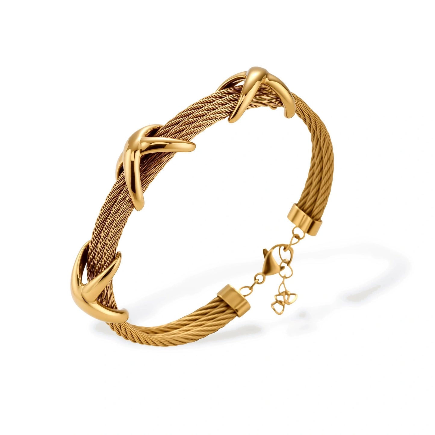Gold-tone multi-strand twisted cable bracelet with polished X-cross knot accents and adjustable lobster clasp chain.