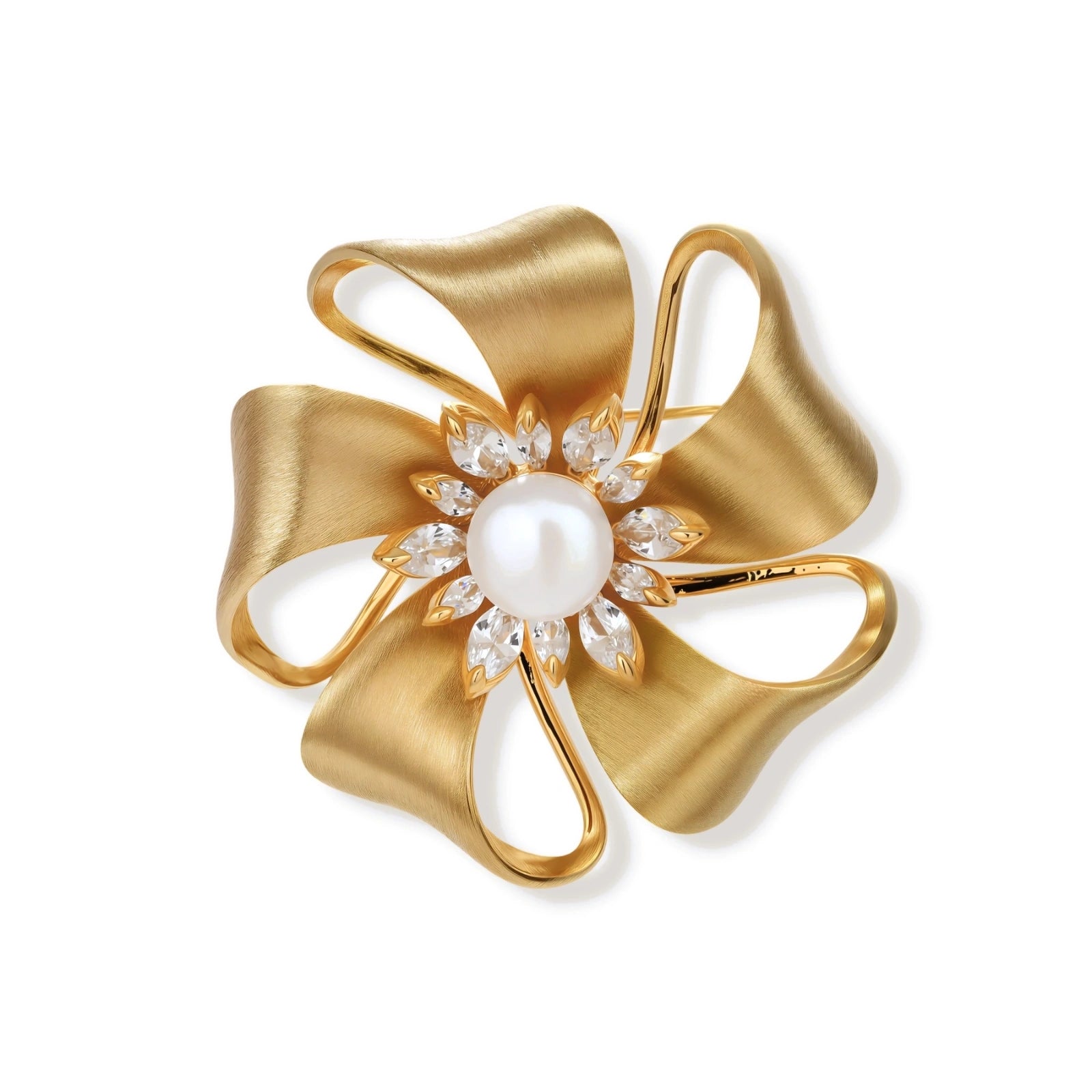 18K gold-plated bow brooch with dimensional ribbon design, pearl center, and sparkling zircon stones on white background.